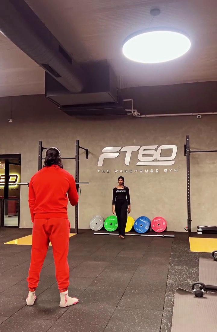 The FT60 floor — colour bumper plates, etched logo wall, members training